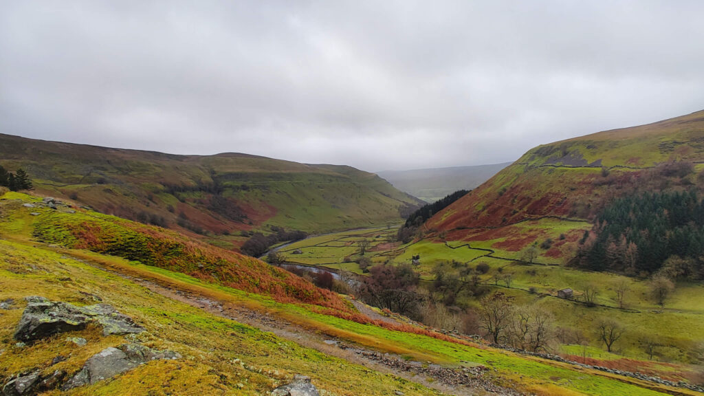 Looking through the valley, The Pennine Trail runs parallel to the river here.