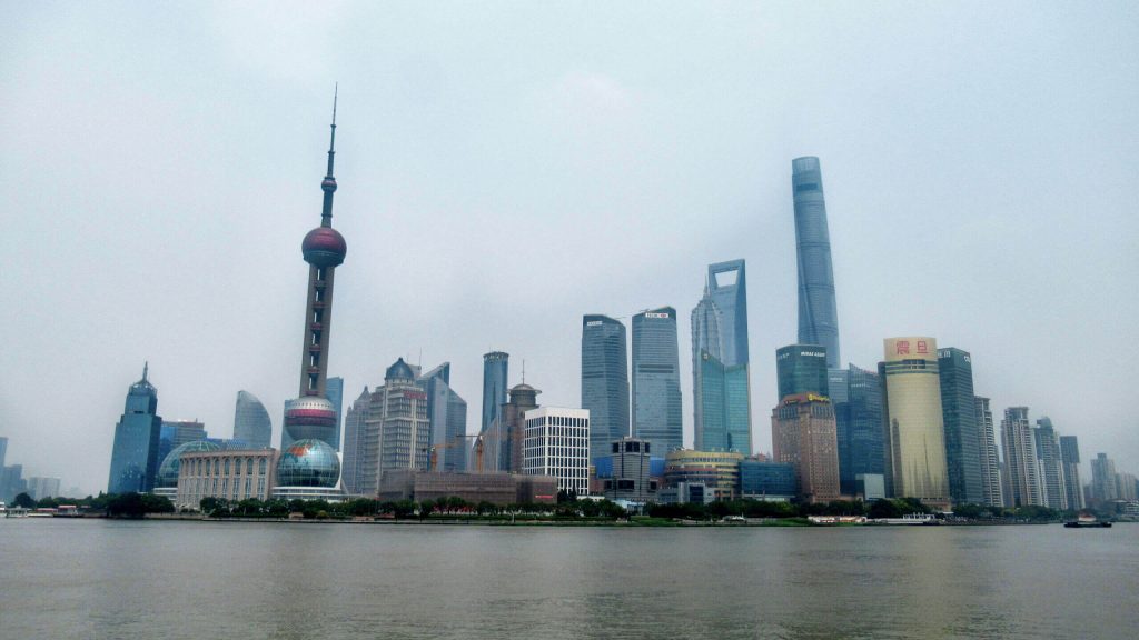 The Shanghai skyline from the Bund on the other side of the river. Noticeable are the Pearl Oriental Tower with it's circular levels and the second tallest building in the world, which looks like a bottle opener. You can see these amazing views during a layover with a China Transit Visa