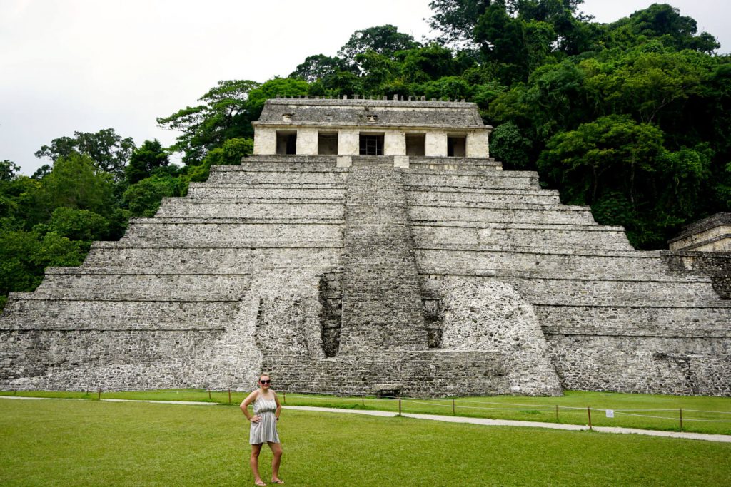 Zoe stood in front of a pyramid ruin at the Palenque Archaeological site. 