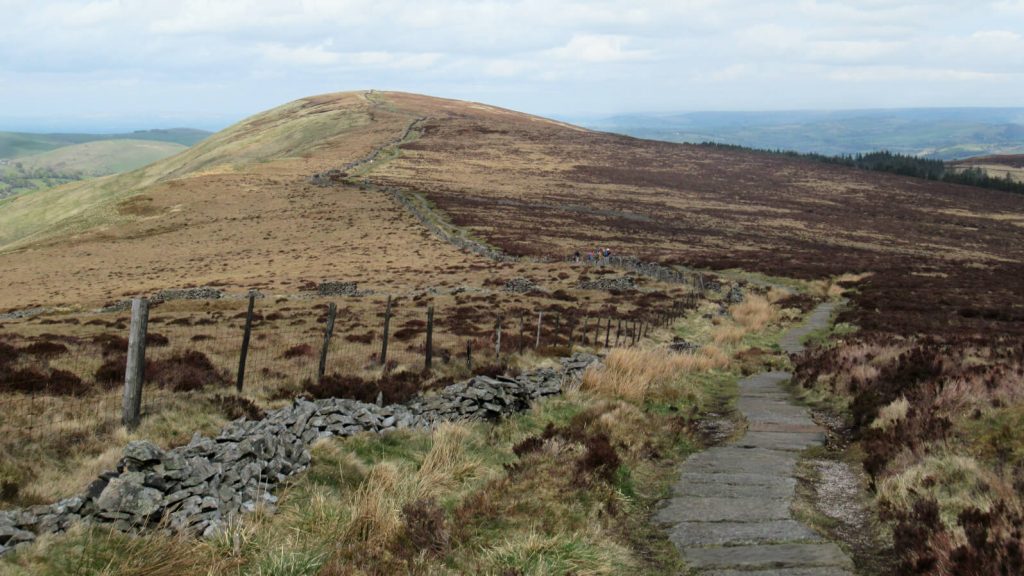 There are many routes to the summit of Shining Tor and all have incredible views over the vibrant-coloured hills of the Peak District.