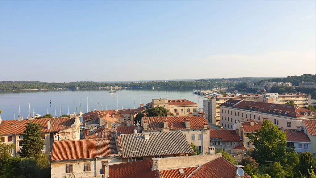 Looking out over the town of Pula from the central Fortress. The skies are blue and the weather is good.