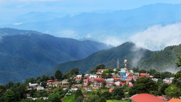 The town of San Jose del Pacifico, Oaxaca in all it's glory during a break in the clouds. The mountains continue for miles in the background.