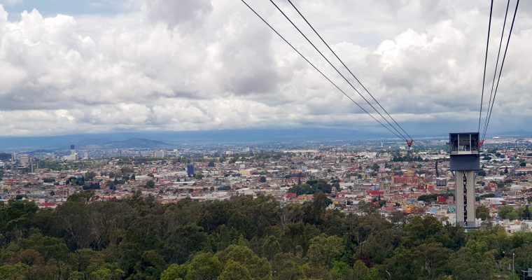 Looking west over the Teleferico Puebla western station and the city in the background