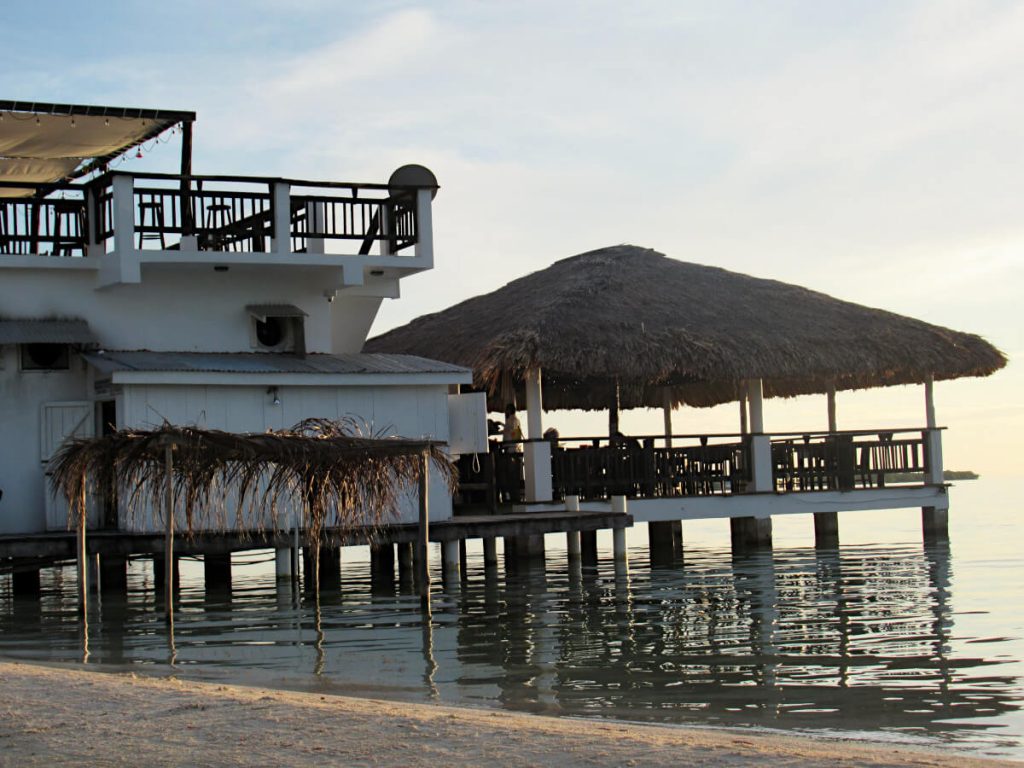 Overwater restaurant and bar with palm leave roof