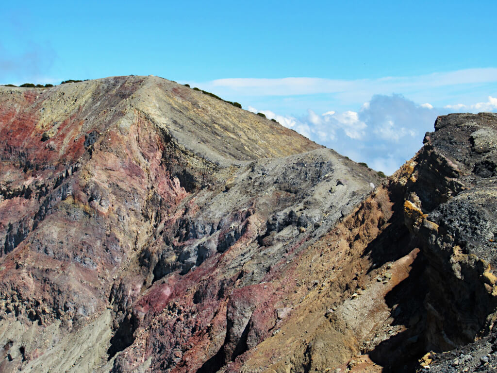 The incredible rock formations inside the crater with so many different colours and different layers