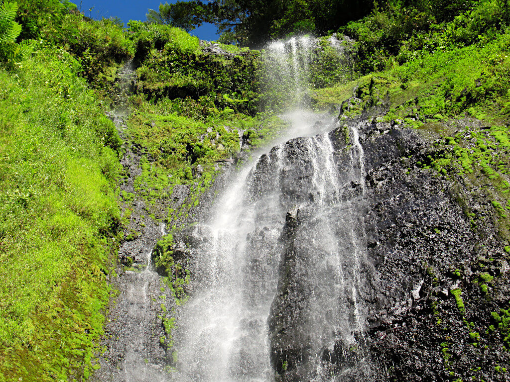 A zoomed in look at the top of the waterfall, taken from the base.