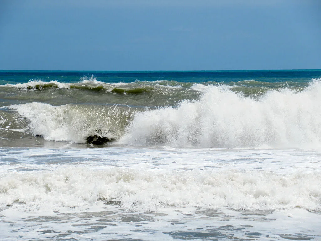 The crashing waves of the Caribbean Sea on Colombia's northern coast