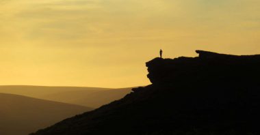 Stood on the edge of Bamford Edge admiring the view at sunset