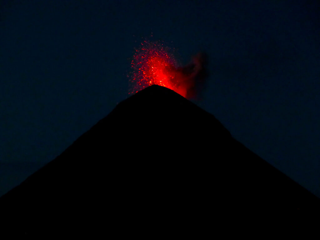 The best thing about hiking volcanoes in Guatemala is seeing active volcanos spew bright orange lava high into the sky at night