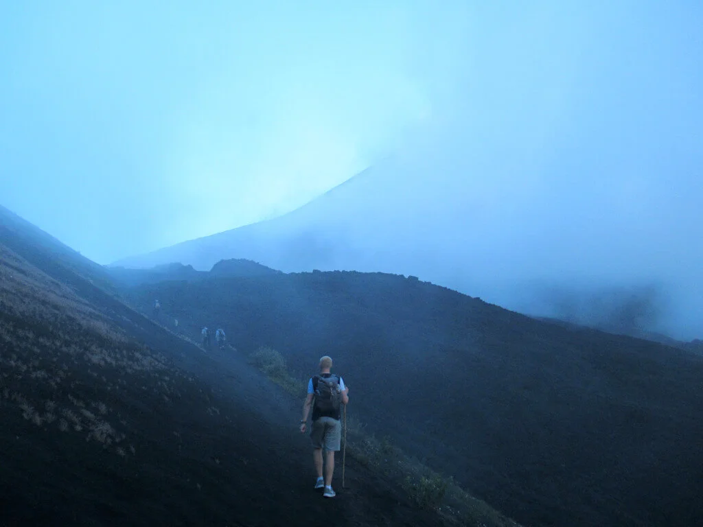 Hiking through the clouds on the way to the viewpoint for the volcano
