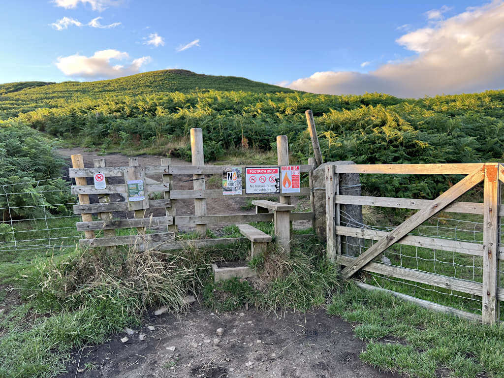 The start of the Bamford Edge walk from New Road, climb the stile to start the climb