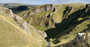 Winnats Pass is a great place to walk to see the best natural beauty in the Peak District: panoramic views, exposed rock and rolling hills