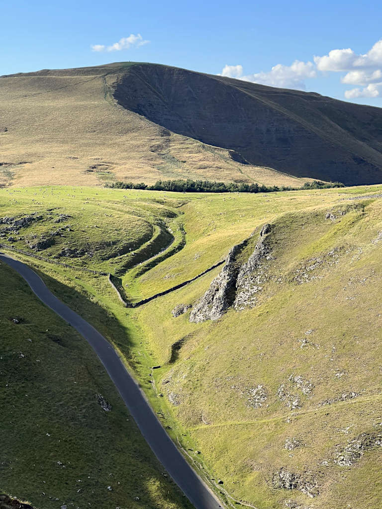 Mam Tor in the background of Winnats Pass road, it's easy to walk to both from this area