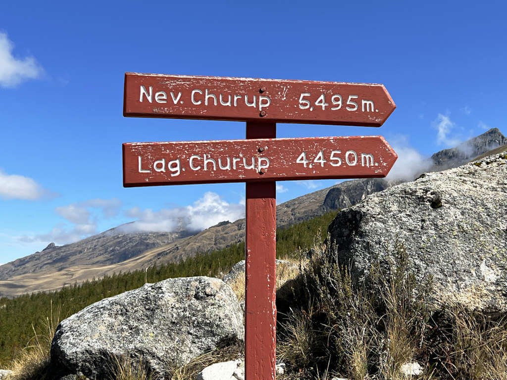 Sign indicating the direction and altitude of Churup lake and peak
