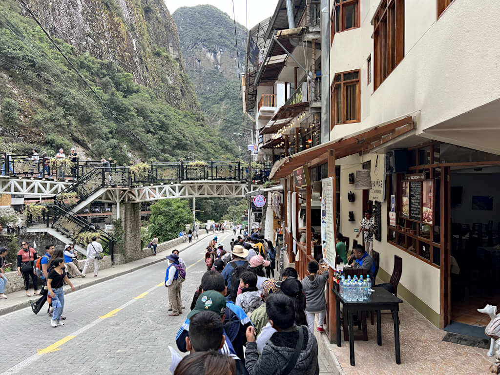 The queue to board a bus in Aguas Calientes, you need to buy your Machu Picchu bus tickets before joining the queue