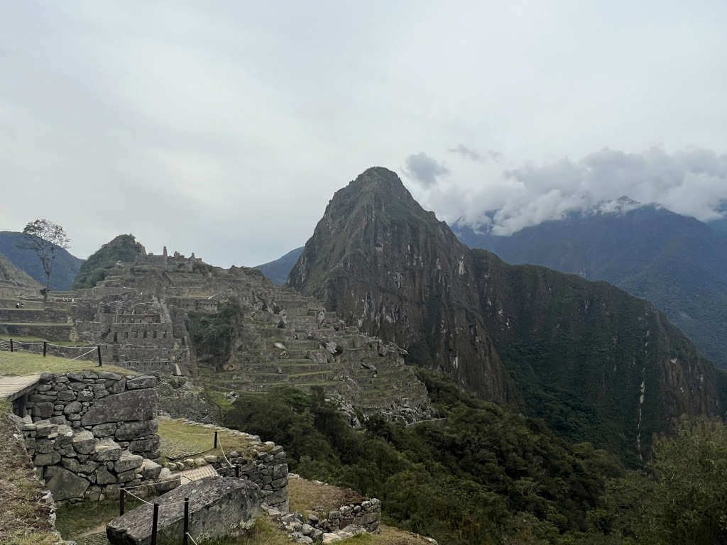 A cloudy afternoon in Machu Picchu with clouds rolling in.