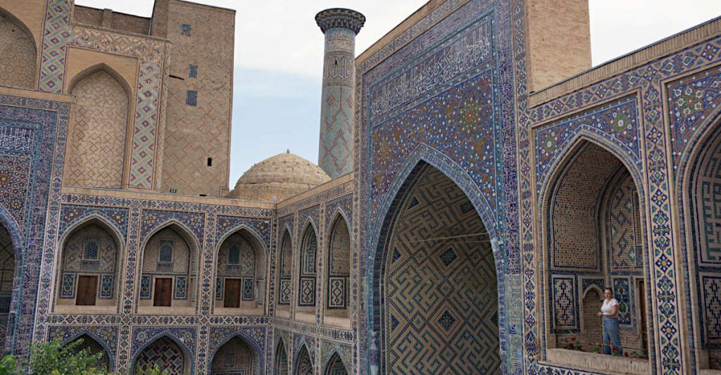 Zoe stood inside the Registan in Samarkand, one of the landmark buildings in Uzbekistan. The blue tiled patterns are unique to this part of the world and are striking.