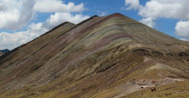 The first of 3 rainbow mountains at Palcoyo with vibrant colours in stripes