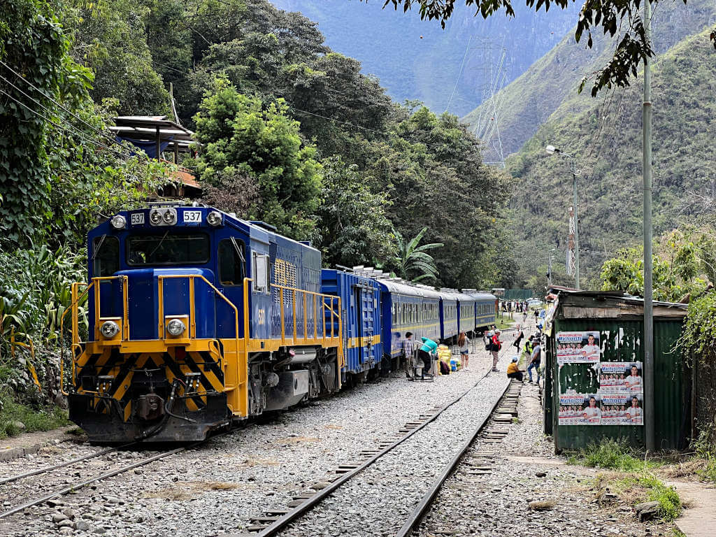 The train that runs from Cusco to Aguas Calientes stationary on the tracks at Hidroelectrica