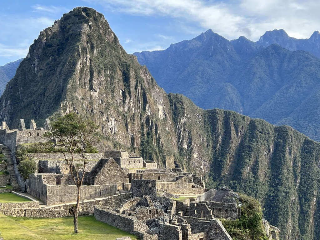 The ruins in front of Huayna Picchu with endless mountains in the background