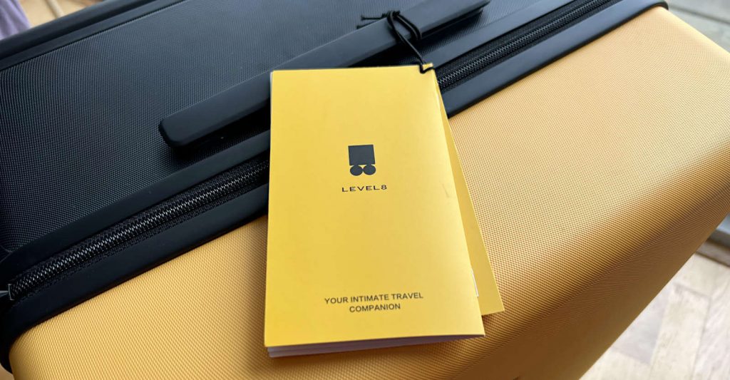 A LEVEL8 luggage review featuring this bright yellow and black suitcase that is easily recognisable