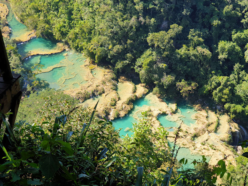 Looking down from the viewpoint to the turquoise pools in Semuc Champey Natural Monument