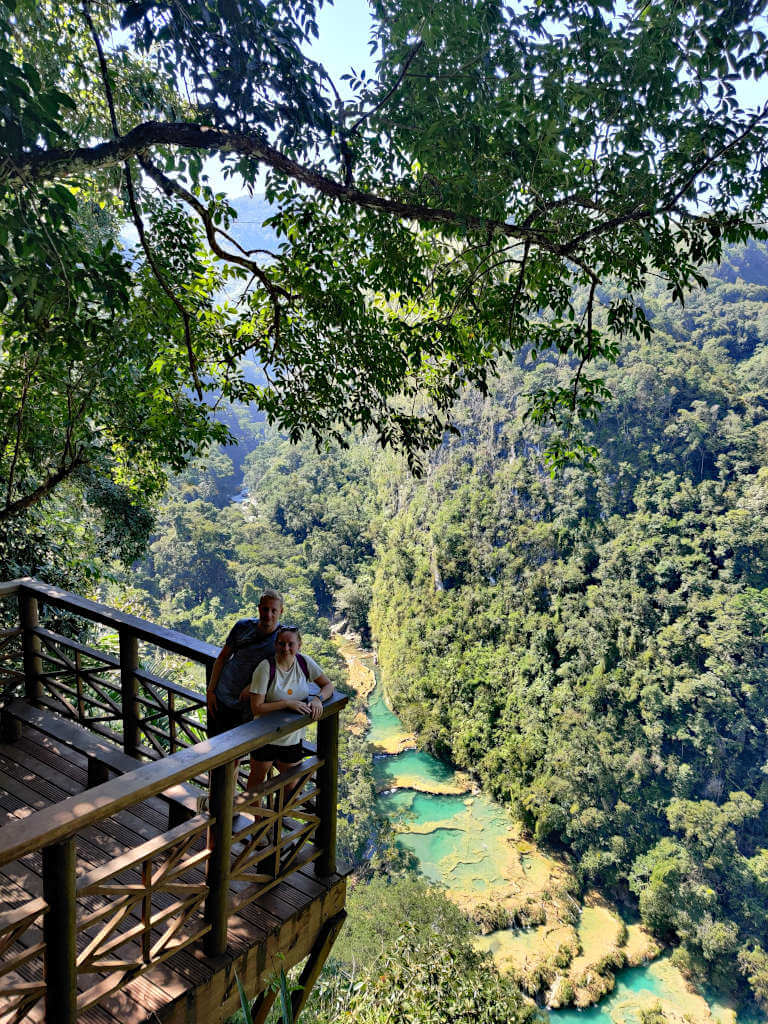 Once you've made the journey from Guatemala City to Semuc Champey, you can stand on the viewpoint high in the trees and look over the brightly coloured pools and jungle