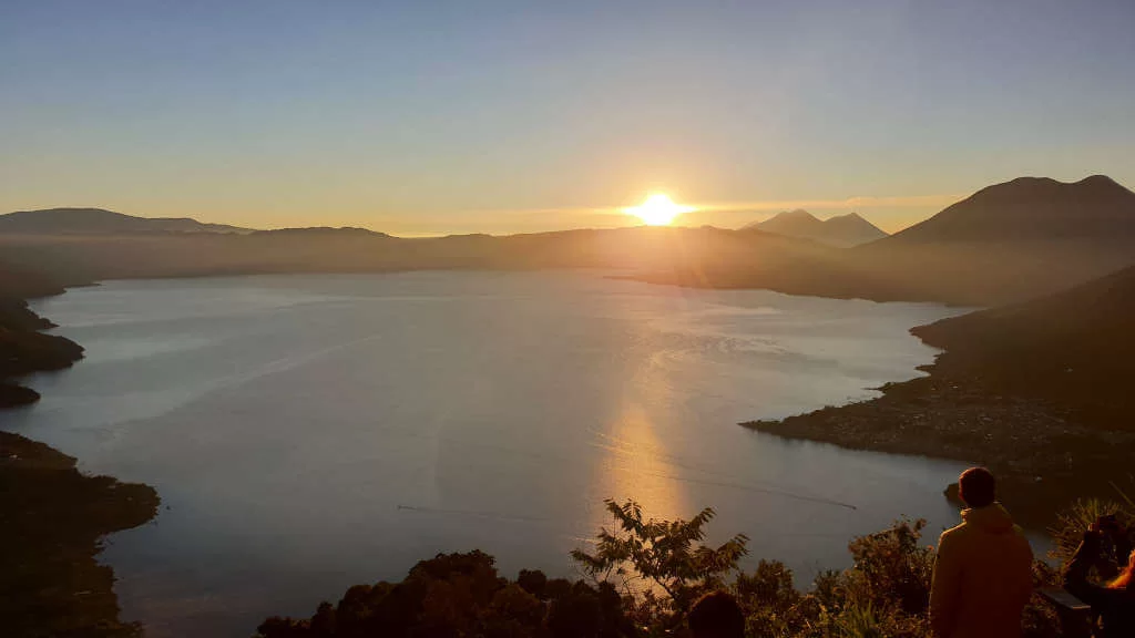 The large Lake Atitlan photographed from the hillside at sunrise