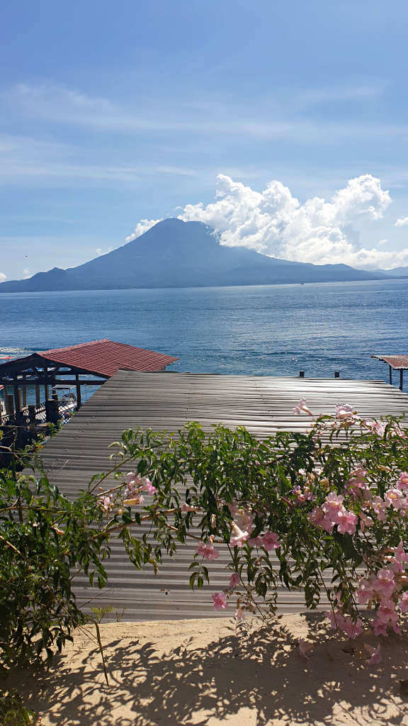 Looking across Lake Atitlan from Santa Cruz la Laguna towards a volcano