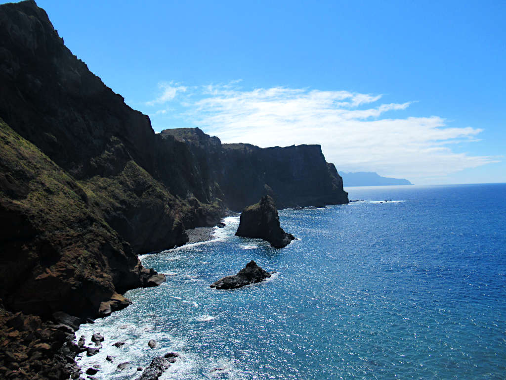 Looking along the dramatic northern coast of Madeira with its cliff edges and splashing waves