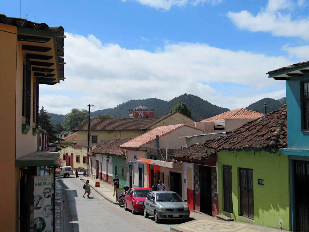 Colourful buildings on a narrow street in Chiapas