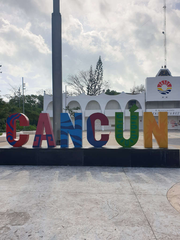 Large, brightly coloured letters that spell out Cancun