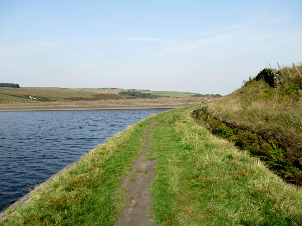 The grassy, unsurfaced path around the southern side of the reservoir