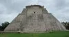 Uxmal - one of the many archaelogical sites in Mexico - with a main and impressive pyramid temple that imposes on the surrounding ruins.