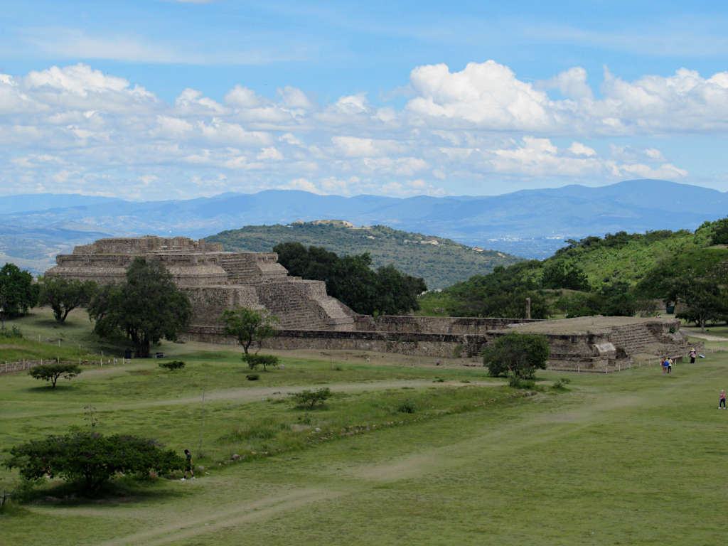 The ruins of Monte Alban with the mountains of Oaxaca in the backdrop.